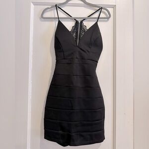 Black tight mini dress with lace backing